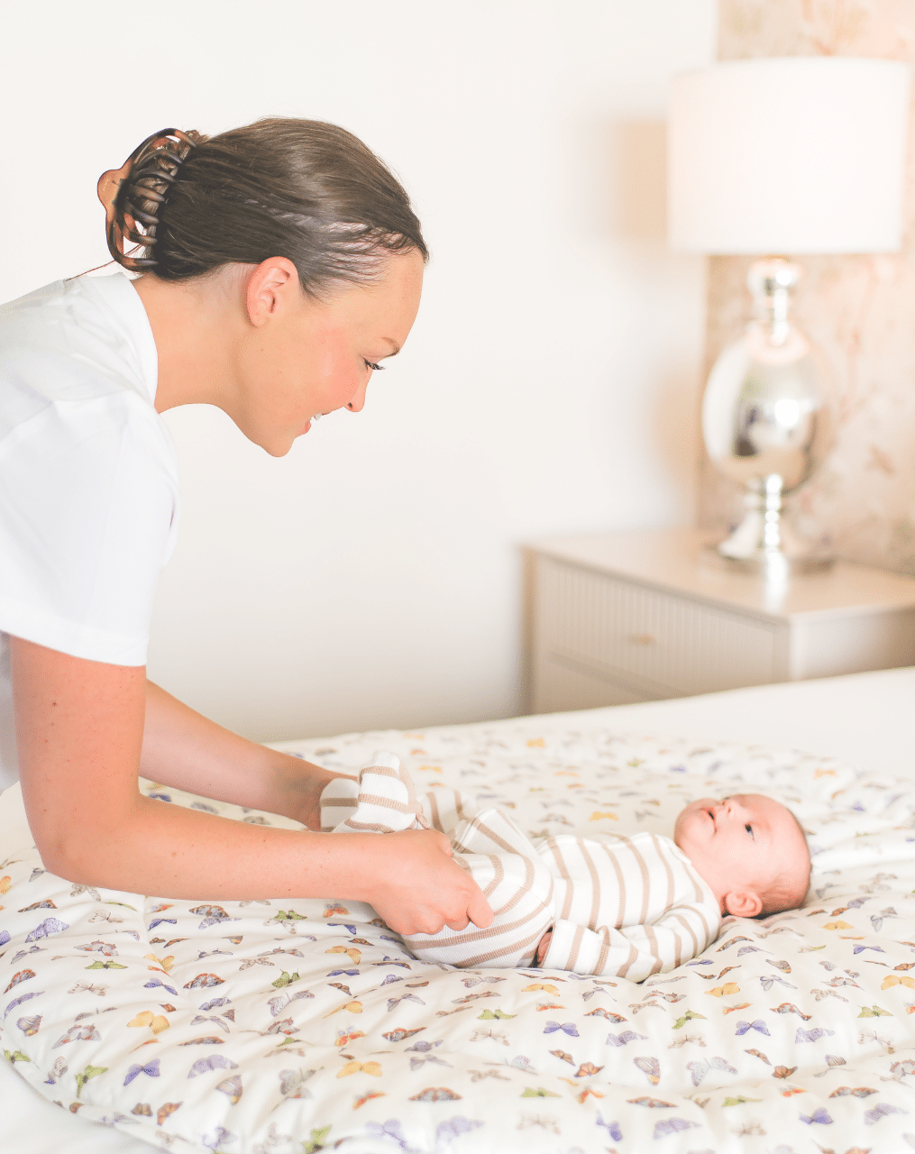 Daycare Tours in Houston 20 Questions You Must Ask the RUBY postnatal Featured Image Blog (3) Daycare Tours In Houston The Ruby Postnatal helper watching the baby